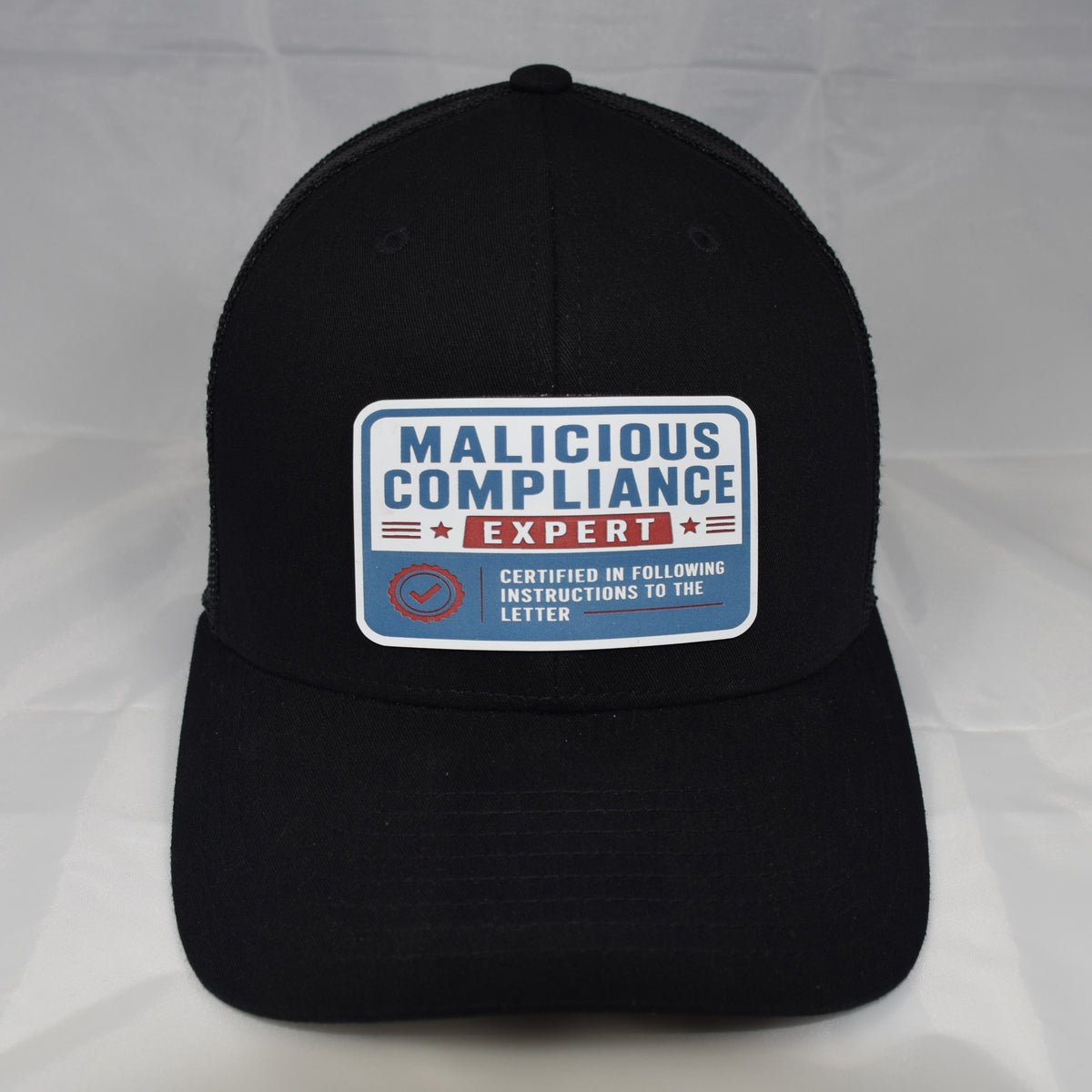 Malicious Compliance Mesh-Back Trucker Hat – Acrylic Patch
